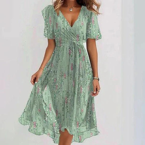 Luchtige midi zomerjurk met korte mouwen voor een stijlvolle en frisse look