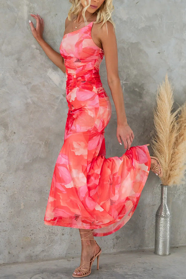 Elegante lange jurk met asymmetrisch model en bloemendessin