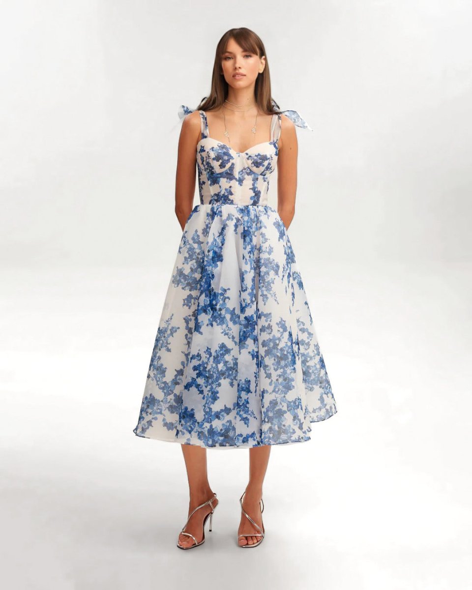 Midi zomerjurk met speelse bloemenlook en smalle bandjes
