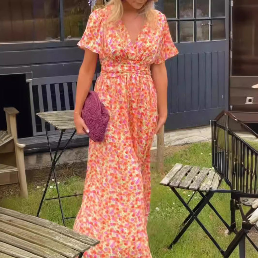 Elegante maxi jurk met v-hals bloemenprint en zomerse korte mouwen