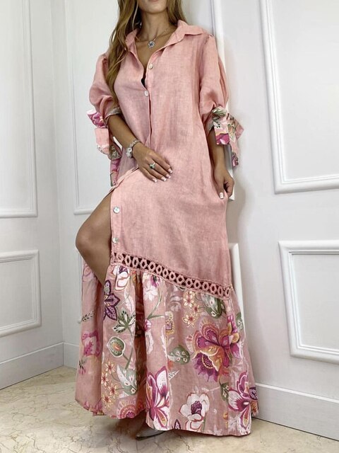 Elegante maxi jurk met subtiel bloemenaccent en doorlopende knopen