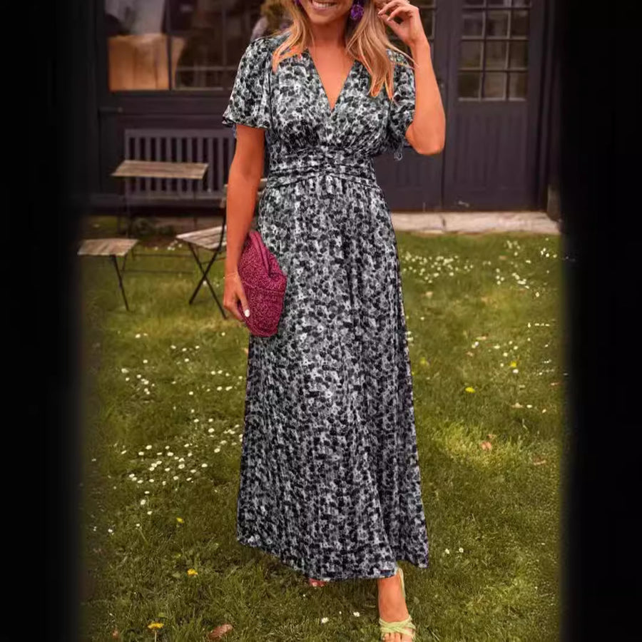 Elegante maxi jurk met v-hals bloemenprint en zomerse korte mouwen