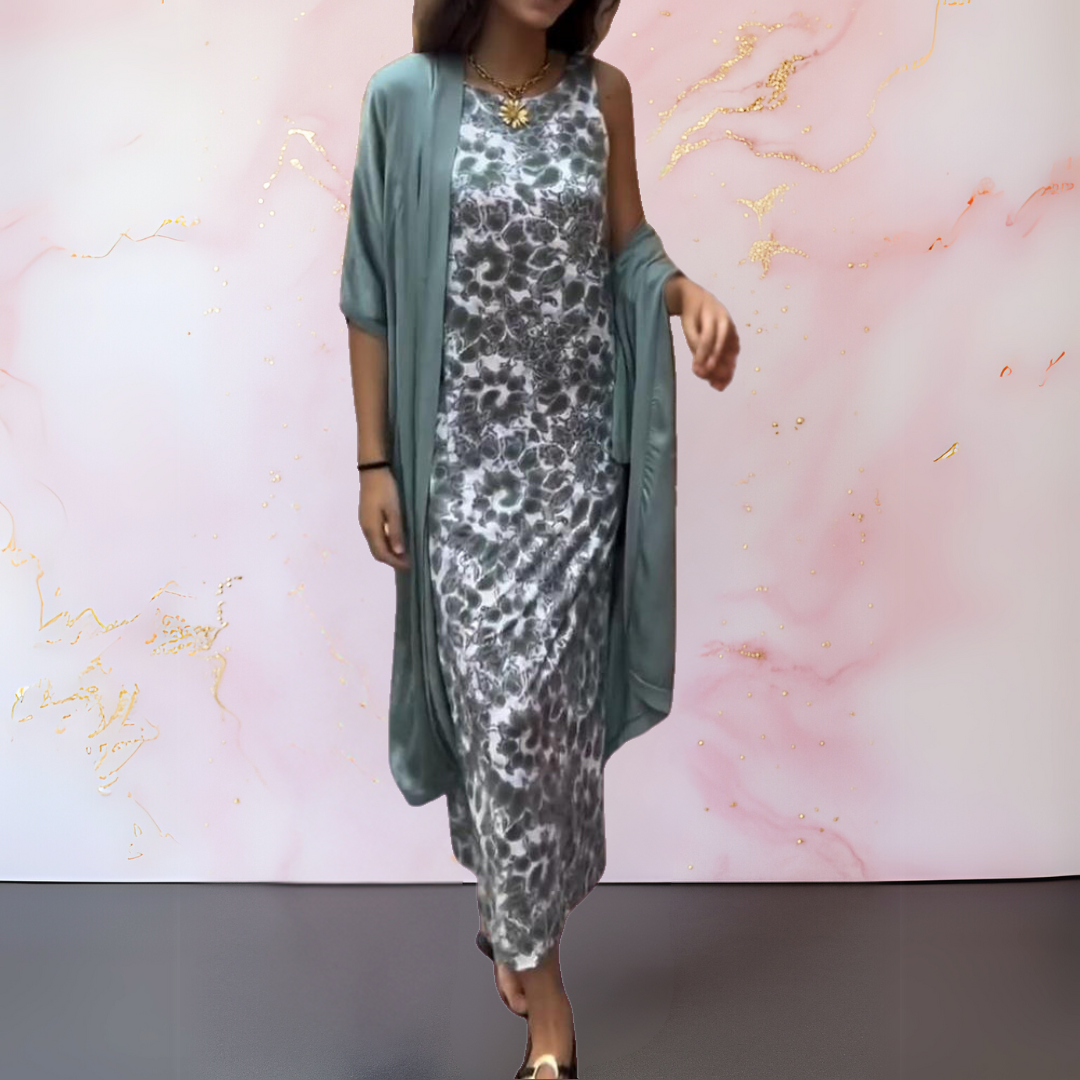 Tweedelige outfit met mouwloze maxi jurk en lang open vest