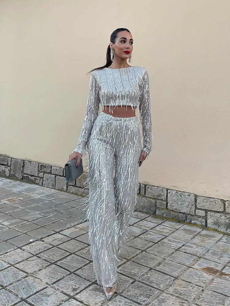 Tweedelige glitterset voor feestelijke avonden met lange mouwen top en glanzende broek