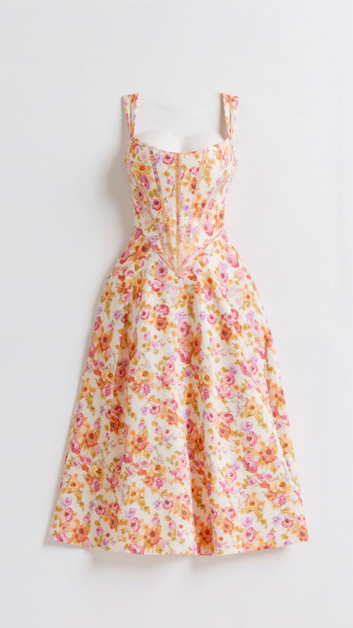 Zomerse midi jurk met bloemenpatroon en ronde halslijn