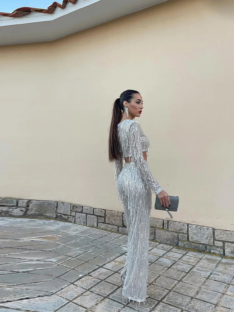 Tweedelige glitterset voor feestelijke avonden met lange mouwen top en glanzende broek