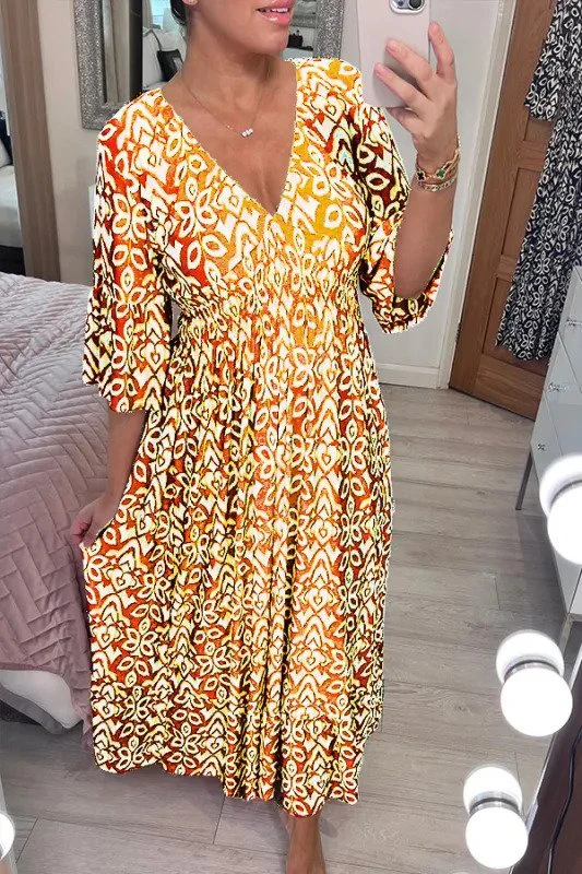 Bohemian maxi jurk met vloeiende pasvorm en halflange mouwen voor een stijlvolle look