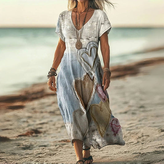 Zomerse maxi damesjurk met strandprint en korte mouwen voor een lichte uitstraling