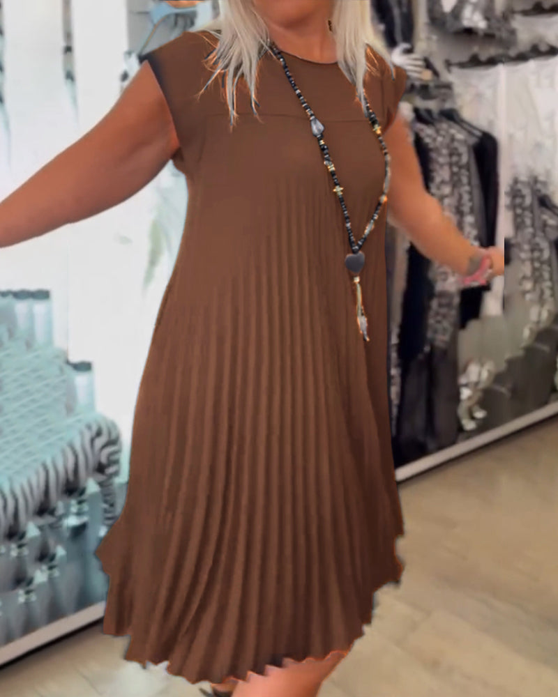 Elegante geplisseerde jurk