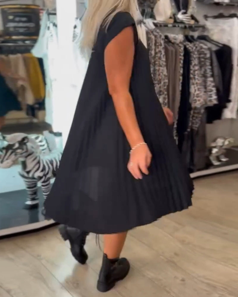 Elegante geplisseerde jurk