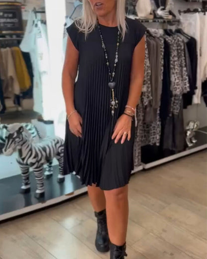 Elegante geplisseerde jurk