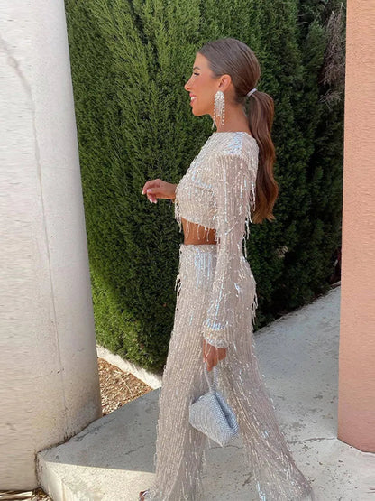 Tweedelige glitterset voor feestelijke avonden met lange mouwen top en glanzende broek